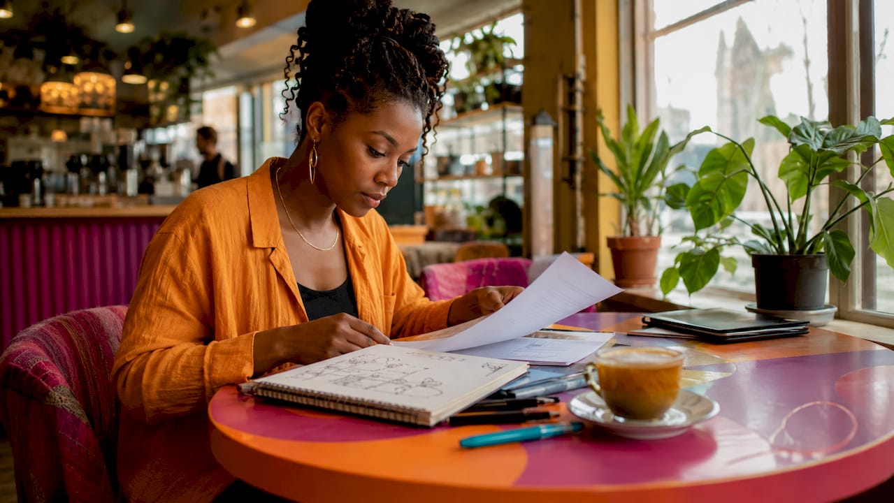 Filmmaker reviewing UK film fund paperwork